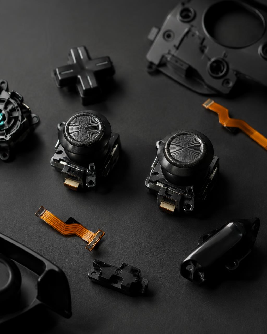 Gaming controller thumbstick modules and ribbon cables